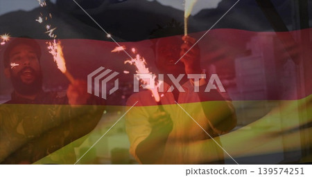 Holding sparklers, four friends in casual clothes celebrating on balcony with tricolor flag overlay Holding sparklers, four friends in casual clothes celebrating on balcony with tricolor flag overlay 139574251