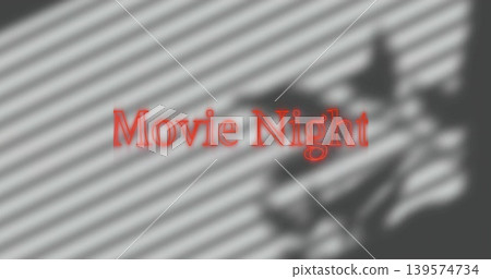 Projecting red text Movie Night at home, blinds casting diagonal shadows, blurred silhouette right Projecting red text Movie Night at home, blinds casting diagonal shadows, blurred silhouette right 139574734