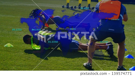 Performing player wearing neon green bib doing plank on grass pitch, with cones, blue data map Performing player wearing neon green bib doing plank on grass pitch, with cones, blue data map 139574771