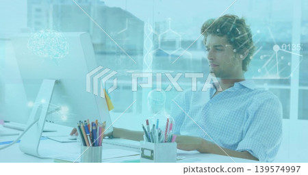Working adult man wearing light blue checked shirt, headset at white desk, with monitor, copy space Working adult man wearing light blue checked shirt, headset at white desk, with monitor, copy space 139574997
