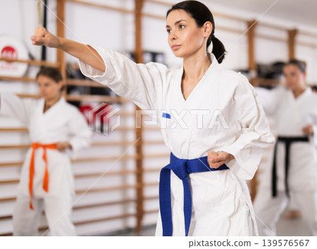Young women during group karate training 139576567