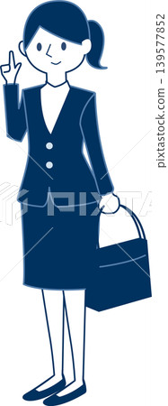一位職業女性手提包，右手比劃著手勢。 139577852