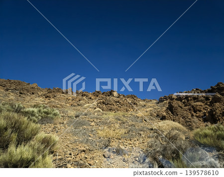 Rocky desert landscape under clear blue sky Rocky desert landscape under clear blue sky 139578610