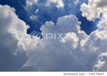 Dramatic Cumulus Clouds in Blue Sky Dramatic Cumulus Clouds in Blue Sky 139578647