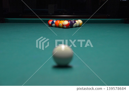 Billiard balls racked on a pool table Billiard balls racked on a pool table 139578684