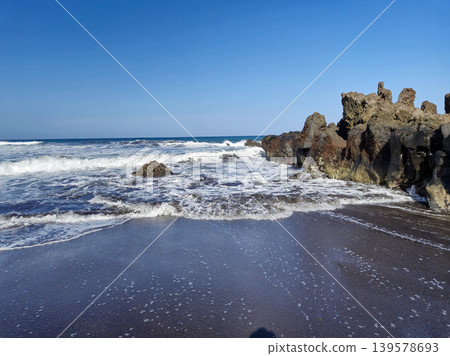 Waves Breaking on Rocky Black Sand Beach Waves Breaking on Rocky Black Sand Beach 139578693