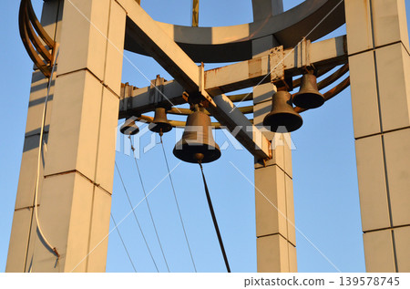 Modern bell tower architecture against blue sky Modern bell tower architecture against blue sky 139578745