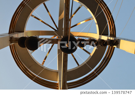 Abstract Metal Sculpture Against Blue Sky Abstract Metal Sculpture Against Blue Sky 139578747
