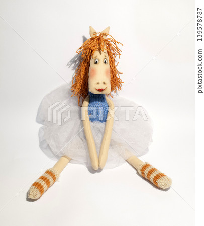 Handmade horse doll on white background Handmade horse doll on white background 139578787