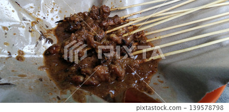 Traditional Indonesian chicken satay with peanut sauce. Traditional Indonesian chicken satay with peanut sauce. 139578798