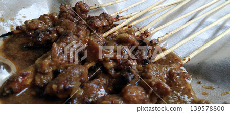 Traditional Indonesian chicken satay with peanut sauce. Traditional Indonesian chicken satay with peanut sauce. 139578800