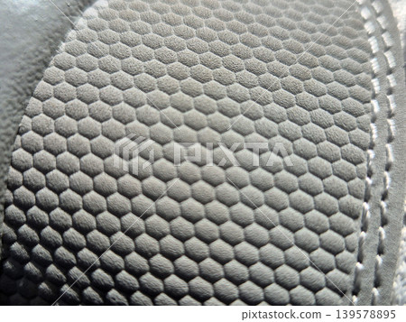 Close up of textured hexagonal rubber surface Close up of textured hexagonal rubber surface 139578895
