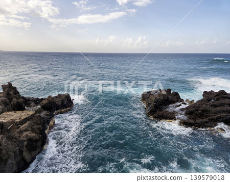 Rocky Ocean Shoreline With Gentle Waves Rocky Ocean Shoreline With Gentle Waves 139579018