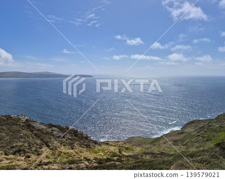 Sunny coastal landscape with sparkling ocean horizon Sunny coastal landscape with sparkling ocean horizon 139579021