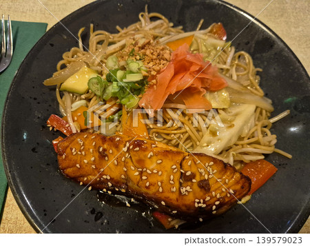 Noodle bowl with glazed salmon and vegetables Noodle bowl with glazed salmon and vegetables 139579023