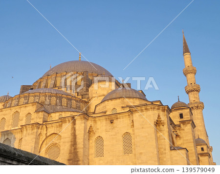 Historic mosque with domes and tall minaret Historic mosque with domes and tall minaret 139579049