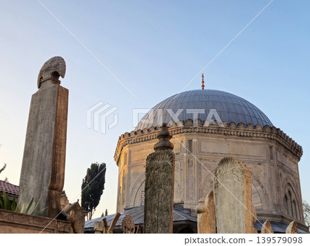 Historic domed mausoleum with carved stone monuments Historic domed mausoleum with carved stone monuments 139579098