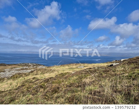 Coastal landscape with grassy cliffs and open sea Coastal landscape with grassy cliffs and open sea 139579232