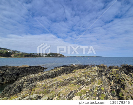 Rocky coastal landscape under dramatic cloudy sky Rocky coastal landscape under dramatic cloudy sky 139579246