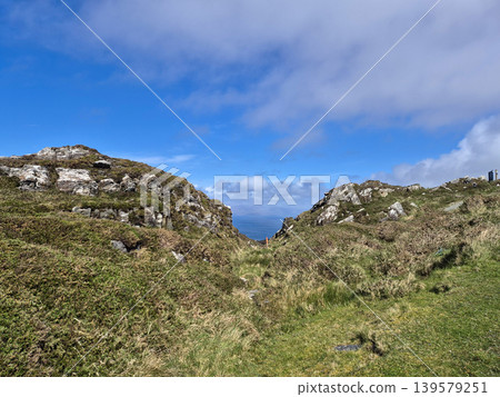 Rocky coastal path leading to the sea Rocky coastal path leading to the sea 139579251