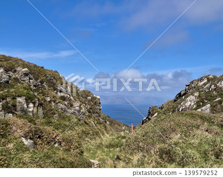 Rocky coastal path overlooking the sea Rocky coastal path overlooking the sea 139579252