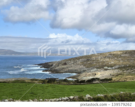 Rocky coastal landscape with ocean and clouds Rocky coastal landscape with ocean and clouds 139579262