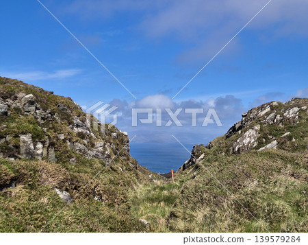 Rocky Coastal Path Leading to Blue Ocean Rocky Coastal Path Leading to Blue Ocean 139579284