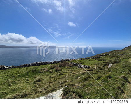 Coastal Landscape with Blue Sea and Green Hills Coastal Landscape with Blue Sea and Green Hills 139579289