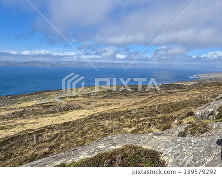 Coastal landscape with winding road and dramatic sky Coastal landscape with winding road and dramatic sky 139579292