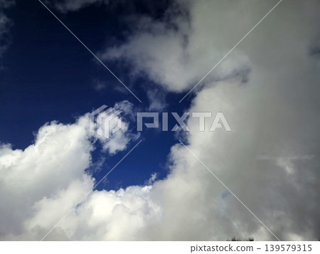 Dramatic Cloudscape Over Deep Blue Sky Dramatic Cloudscape Over Deep Blue Sky 139579315
