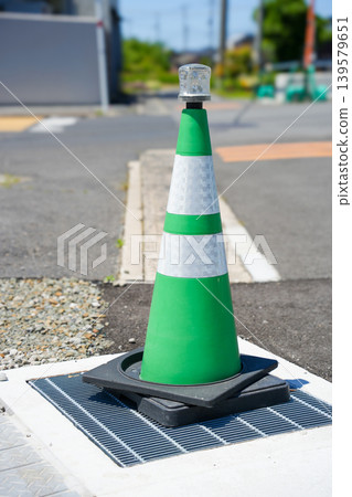 Green and white two-tone traffic cone Green and white two-tone traffic cone 139579651