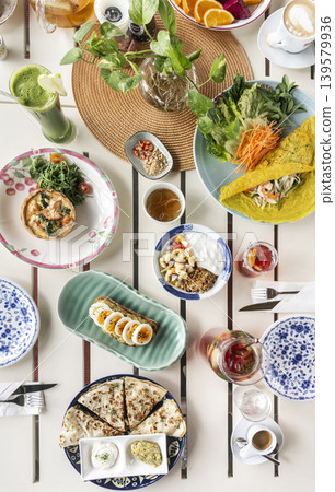 mixed western healthy food meal on restaurant table outdoors in singapore restaurant mixed western healthy food meal on restaurant table outdoors in singapore restaurant 139579936