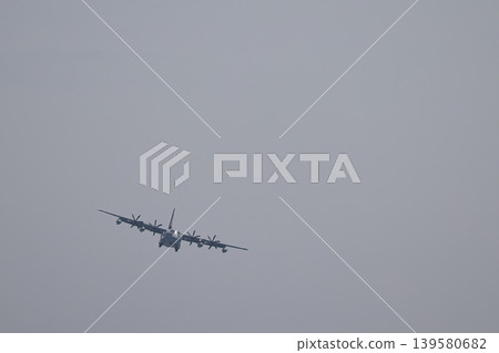 C-130 transport aircraft turning C-130 transport aircraft turning 139580682
