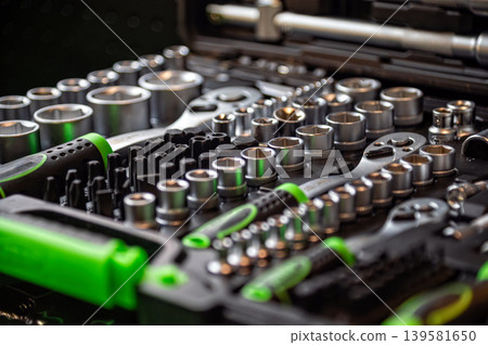 Various tools arranged in a toolbox with a focus on the socket and wrench set Various tools arranged in a toolbox with a focus on the socket and wrench set 139581650