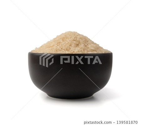 White parboiled rice grains. Dry uncooked ponni rice, small organic basmati White parboiled rice grains. Dry uncooked ponni rice, small organic basmati 139581870