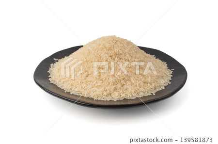 White parboiled rice grains. Dry uncooked ponni rice, small organic basmati White parboiled rice grains. Dry uncooked ponni rice, small organic basmati 139581873