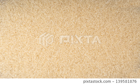 White parboiled rice grains. Dry uncooked ponni rice, small organic basmati White parboiled rice grains. Dry uncooked ponni rice, small organic basmati 139581876
