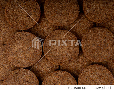 Party pumpernickel, whole grain rye bread rounds Party pumpernickel, whole grain rye bread rounds 139581921
