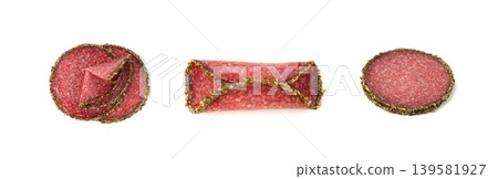 Pepper salami cuts isolated, thin sausage slices. Sliced dry chorizo, sausages round pieces Pepper salami cuts isolated, thin sausage slices. Sliced dry chorizo, sausages round pieces 139581927