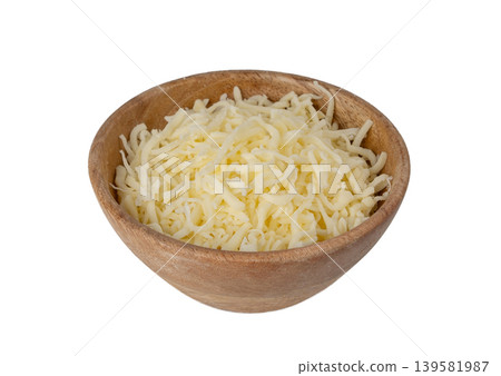 Grated mozzarella cheese. Shredded mozarella texture Grated mozzarella cheese. Shredded mozarella texture 139581987