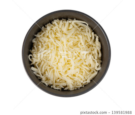 Grated mozzarella cheese. Shredded mozarella texture Grated mozzarella cheese. Shredded mozarella texture 139581988