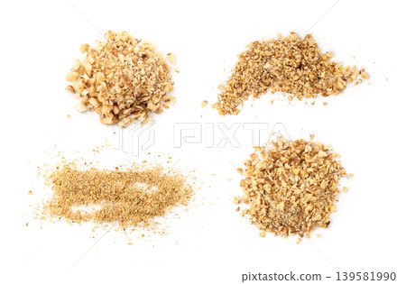 Grated wallnut , broken roasted walnuts, heap of nuts crumbs, whole kernel pieces, fractions Grated wallnut , broken roasted walnuts, heap of nuts crumbs, whole kernel pieces, fractions 139581990