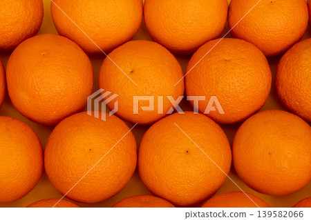 Many whole oranges pile, clementine fruits background Many whole oranges pile, clementine fruits background 139582066