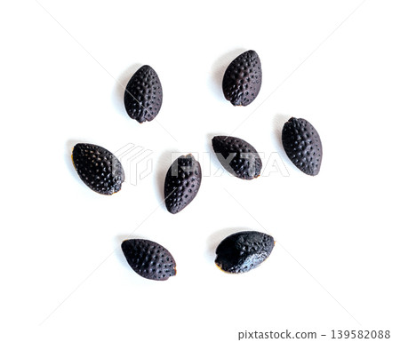 Passion fruit black dry seeds isolated Passion fruit black dry seeds isolated 139582088