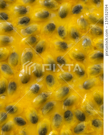 Passion fruit seeds textured background Passion fruit seeds textured background 139582094