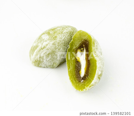 Matcha mochi rice cake, green tea daifuku, Japanese traditional dessert, round wagashi Matcha mochi rice cake, green tea daifuku, Japanese traditional dessert, round wagashi 139582101