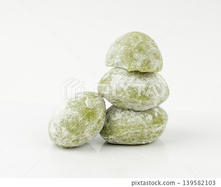 Matcha mochi rice cake, green tea daifuku, Japanese traditional dessert, round wagashi Matcha mochi rice cake, green tea daifuku, Japanese traditional dessert, round wagashi 139582103