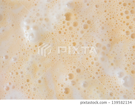Coffee milkshake texture closeup Coffee milkshake texture closeup 139582134