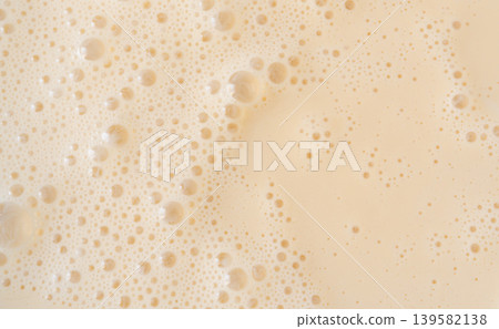 Coffee milkshake texture closeup Coffee milkshake texture closeup 139582138