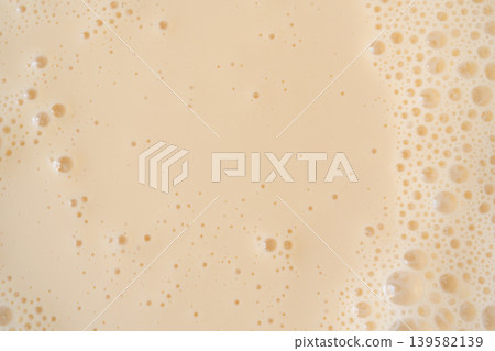 Coffee milkshake texture closeup Coffee milkshake texture closeup 139582139
